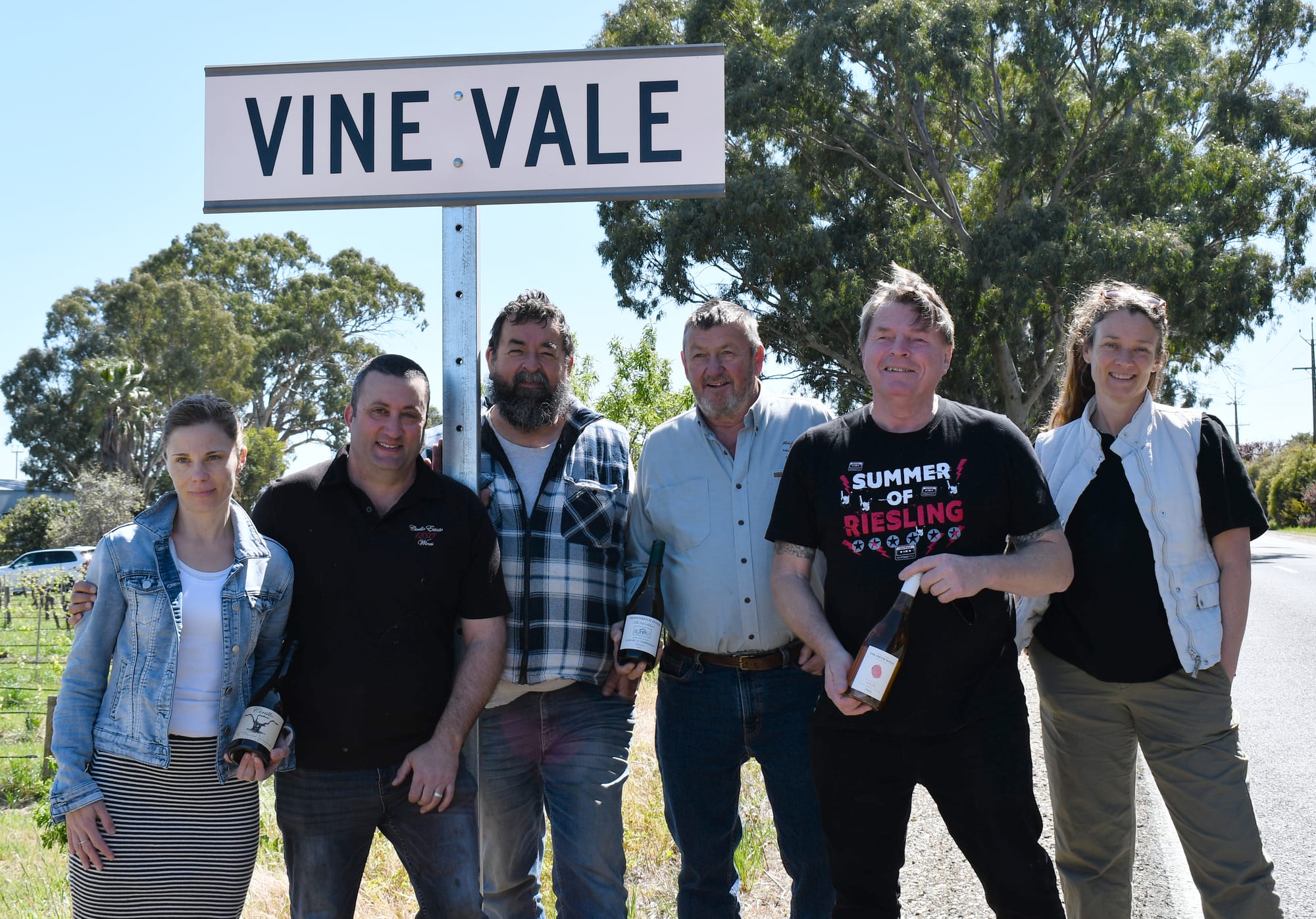 Open doors and wine bottles at Vine Vale Shed Day