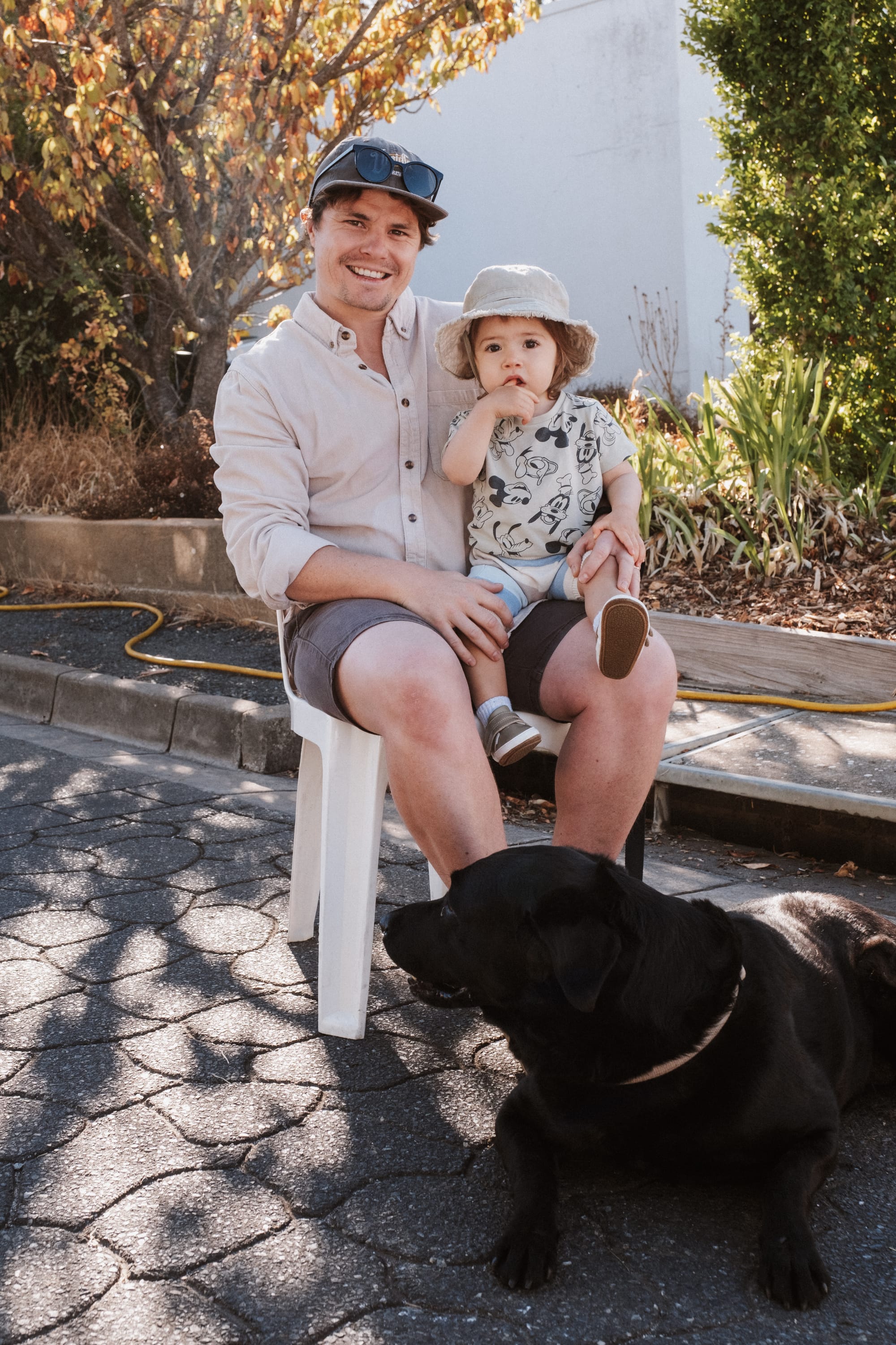 Josh and Norman Oakford with Harley the Labrador.