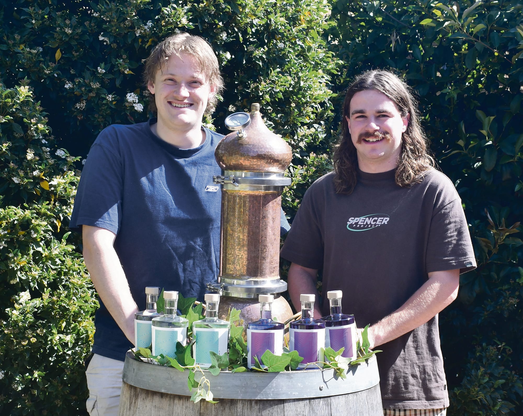 Friends distilling a local success