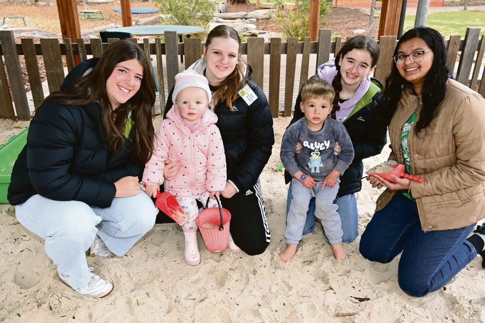 Lending a hand in the sand post image