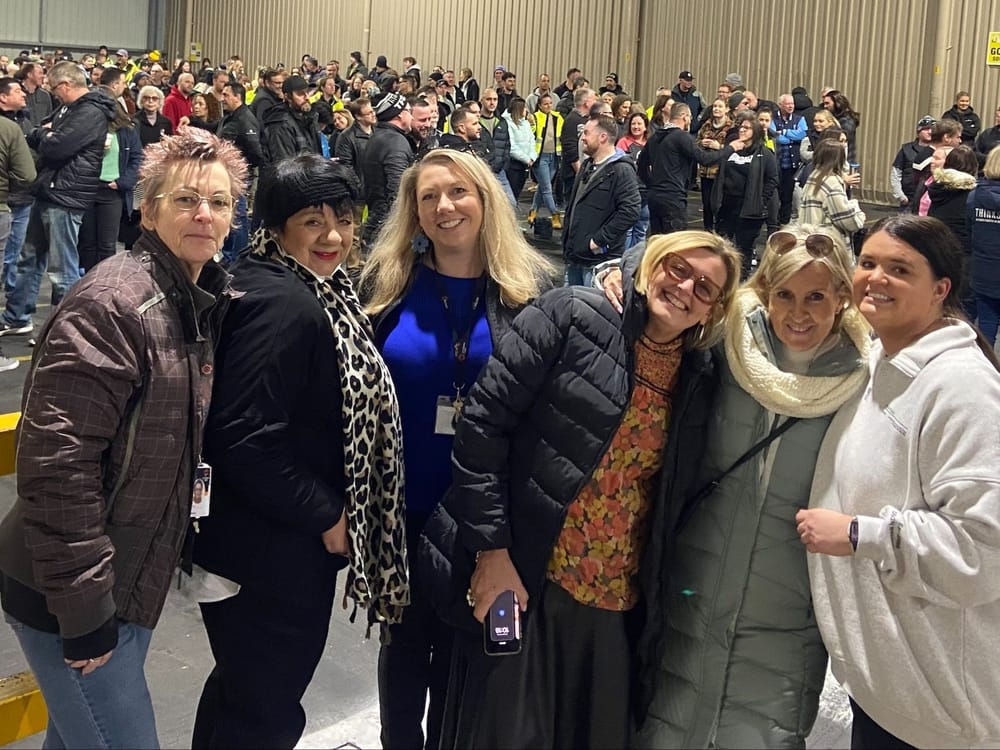 Workers roll up their sleeves for Lutheran Care post image