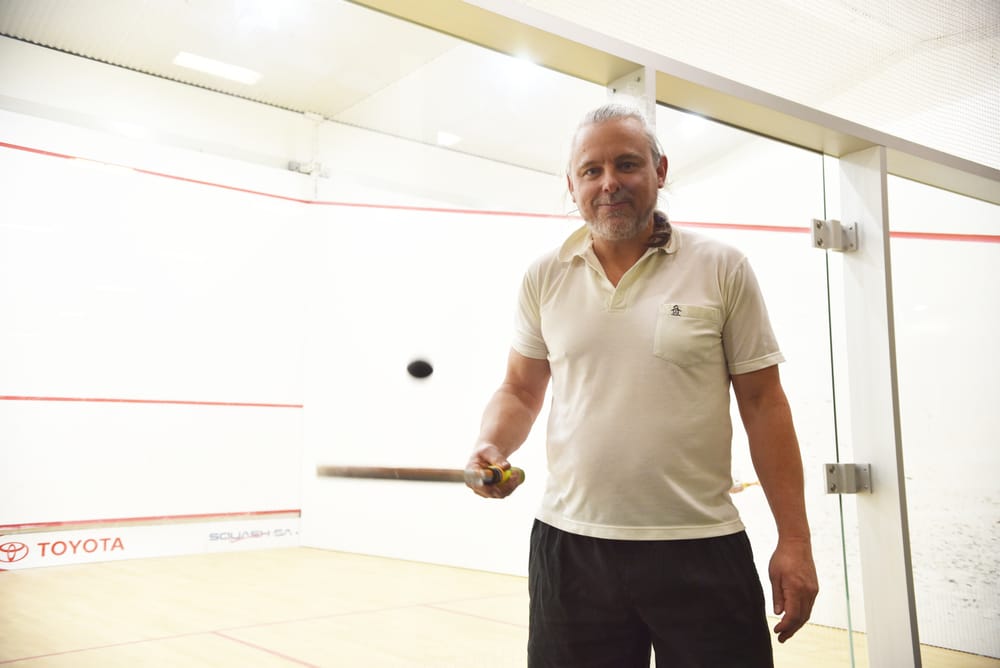 Squash Player crowned top of the court post image