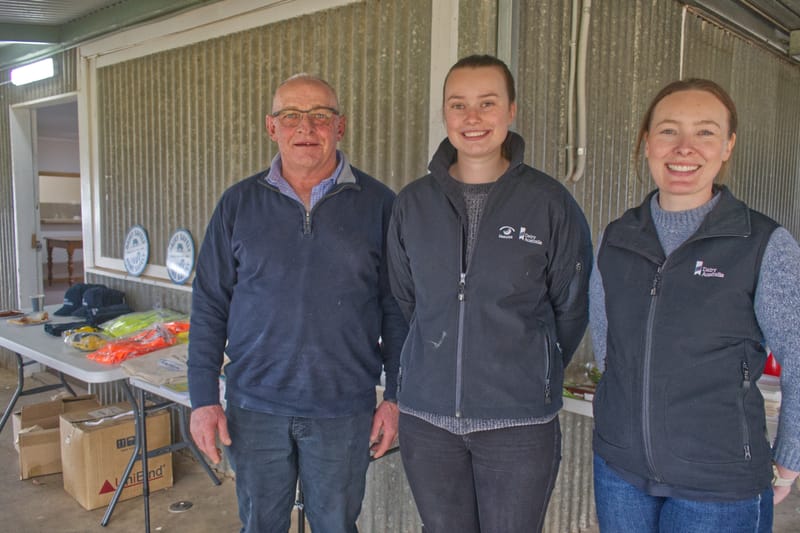 Local dairy farmers share a chat and a good feed post image