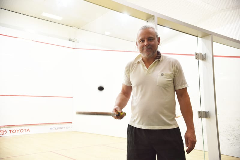 Squash Player crowned top of the court post image